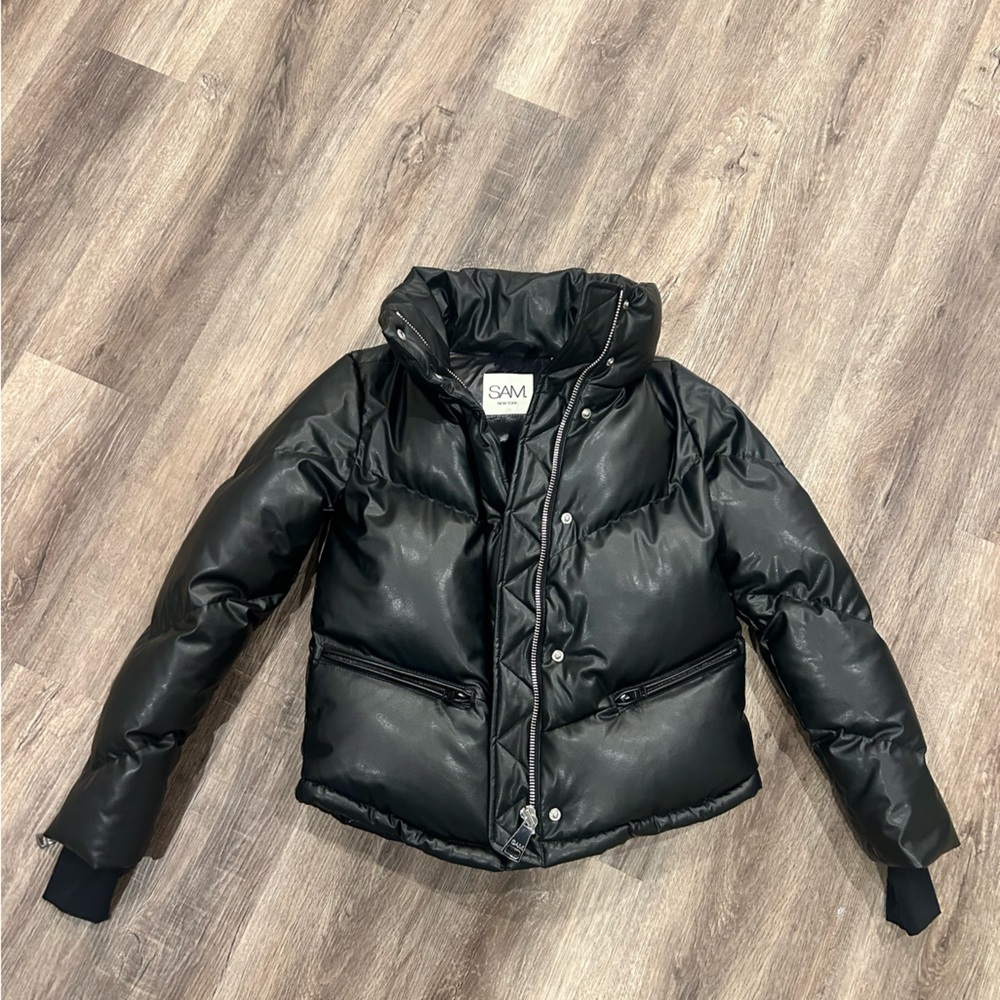 BRAND NEW “Sam” brand black puffer ski and winter jacket. Size XS.